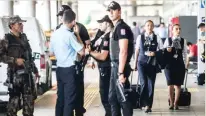  ??  ?? Turkish police officers stand guard near the explosion site at Ataturk Airport in Istanbul in a file photo. (AFP)