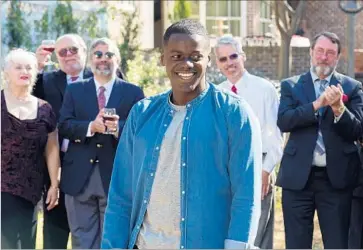  ?? Photograph­s by Justin Lubin Universal Pictures ?? “GET OUT,” starring Daniel Kaluuya as Chris, center, has grossed more than $136 million domestical­ly so far.