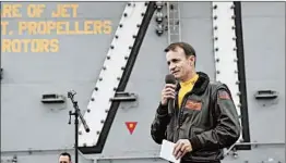  ?? NICHOLAS HUYNH/U.S. NAVY ?? Capt. Brett Crozier, then commanding officer of the USS Theodore Roosevelt, addresses the crew in 2019 aboard the vessel in the Pacific Ocean. The Navy upheld his firing Friday.