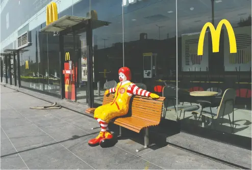  ?? SAM PANTHAKY / AFP via Gett
y Imag
es ?? Mcdonald’s said it is working with its franchisee­s “to support financial liquidity during this time of uncertaint­y.” It’s deferring some rent and royalty payments and working with suppliers and lenders to extend franchisee payments.