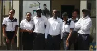  ?? ?? Windscreen Fitment Centre staffers posing for a group photo at the company’s premises in Harare