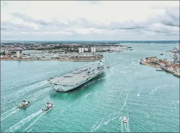  ?? Picture: Mark Cox ?? COMING HOME HMS Queen Elizabeth arriving in Portsmouth yesterday.