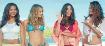  ??  ?? Brace yourself: Ariel Meredith, Hannah Davis, Jessica Gomes and Chrissy Teigen in the Air New Zealand safety video.