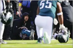  ?? MATT SLOCUM — THE ASSOCIATED PRESS ?? After the Eagles watched defensive end Josh Sweat carted off the field Sunday with a neck injury, they can imagine what their peers in Buffalo are feeling after Damar Hamlin went into cardiac arrest during a game Monday.