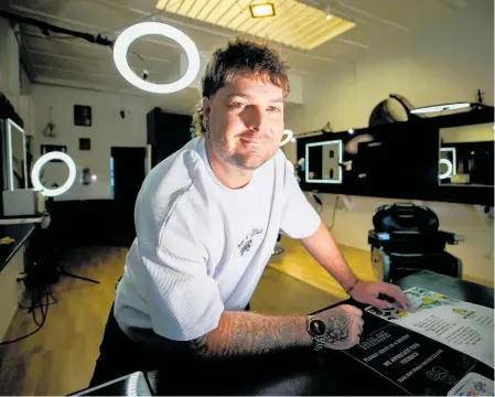  ?? Photo / Paul Taylor ?? Brad Warren of Boxed Out Barbershop aims to have a safe space for men while they get their hair cut.