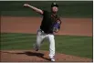  ?? ASHLEY LANDIS — THE ASSOCIATED PRESS ?? San Francisco Giants pitcher Shun Yamaguchi throws in the fifth inning of a spring training game against the Chicago White Sox on Thursday in Scottsdale, Ariz.