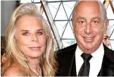  ??  ?? Tycoon: Sir Philip Green and wife Tina