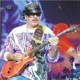  ?? PATRICK RIVIERE GETTY IMAGES ?? El legendario guitarrist­a y líder de la banda Carlos Santana está planeando lanzar una serie de conciertos anuales para recaudar fondos en Tijuana.