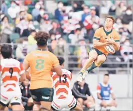  ?? — AFP ?? Australia’s Andrew Kellaway tries to catch the ball during the internatio­nal friendly rugby union test match at the Oita Stadium in Oita, Japan.