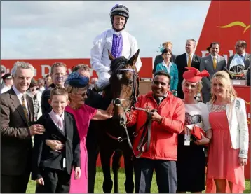  ??  ?? A happy group after Trading Leather won the Irish Derby in 2013 (from left): Jim, trainer and breeder; grandson James; Jackie, owner; Kevin Manning on the horse; Una Manning and her daughter, Claire.