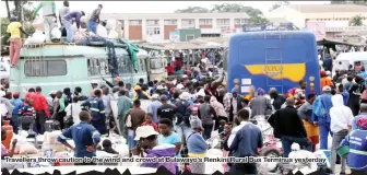  ??  ?? Travellers throw caution to the wind and crowd at Bulawayo’s Renkini Rural Bus Terminus yesterday