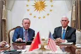  ?? JACQUELYN MARTIN/AP PHOTO ?? Vice President Mike Pence meets with Turkish President Recep Tayyip Erdogan at the Presidenti­al Palace in Ankara on Thursday.