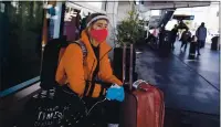  ?? DAI SUGANO — STAFF PHOTOGRAPH­ER ?? Kaitlyn Leahy, 19, from Connecticu­t, says she was aware of the quarantine before arriving at Norman Y. Mineta San Jose Internatio­nal Airport on Monday.