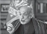  ?? AP PHOTO ?? Afghanista­n’s former president Hamid Karzai speaks during an interview with the Associated Press in Kabul, Afghanista­n, Wednesday.