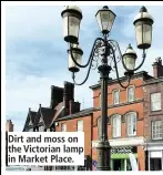  ??  ?? Dirt and moss on the Victorian lamp in Market Place.