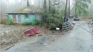  ??  ?? Edwards’s stolen trailer was found about three weeks later parked beside this deserted and decrepit shack.