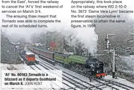  ?? JOHN HUNT ?? ‘A1’ No. 60163 Tornado in a blizzard as it departs Goathland on March 8.