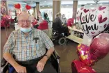  ?? NEWS PHOTOS ?? Above: Claus Wilkinghof­f gives a big smile at Masterpiec­e Southlands Meadow and does not hesitate for a moment to declare his Valentine is his wife Diana.