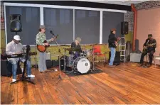  ?? (Special to The Commercial/Richard Ledbetter) ?? The Chad Walker Band backs up Detroit Johnny Johnson for the Blues portion of the Friday Live@5:00 program. From left: Gene “Pops” Cooper, Walker, Earl Bass, C. Roscoe Willis and Johnson.