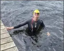  ??  ?? Dr Danny Longman, of Loughborou­gh University, has smashed the existing record for the fastest ever time to swim the full length of all 13 lakes in the Lake District.