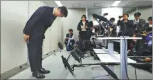  ?? KYODO NEWS VIA ASSOCIATED PRESS ?? Toyota Motor CEO Koji Sato bows at a news conference in Tokyo on Monday.