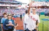  ?? COMMONWEAL­TH MEDIA SERVICES ?? Gov. Josh Shapiro and his family attended a Philadelph­ia Phillies baseball game during the playoffs in Oct. 2023.