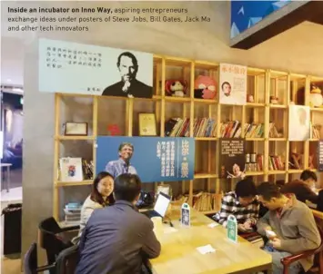  ??  ?? Inside an incubator on Inno Way, aspiring entreprene­urs exchange ideas under posters of Steve Jobs, Bill Gates, Jack Ma and other tech innovators