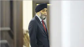  ?? SEAN KILPATRICK / THE CANADIAN PRESS ?? Defence Minister Harjit Sajjan says the military is looking to settle three class-action lawsuits filed by members of the Canadian Armed Forces.