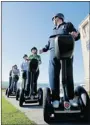  ?? ASSOCIATED PRESS FILES ?? Hotels with sprawling grounds are using Segways to show guests around.