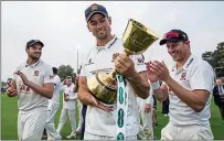  ??  ?? The only way is Essex:
Alastair Cook is all smiles after wrapping up last year’s County Championsh­ip