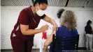  ??  ?? Women have historical­ly reported worse side effects to vaccines, but the data is not tracked consistent­ly. Data on other gender and sexual minorities is even more scarce