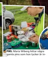  ?? FOTO: CLAUDIO BRITOS ?? PINS. Maria Wiberg hittar några gamla pins som hon tycker är intressant­a.