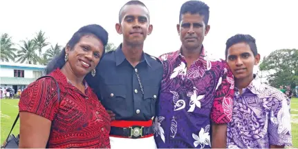  ?? Photo: Wati Talebula ?? Constable Ronit Rajnesh Kumar with his mother Ashni Shika Devi, father Rohit Rajnesh Deo and brother Rohil Kumar after the passing out parade at the Fiji Police Academy in Nasova on February 15, 2019.