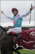  ?? AP PHOTO/MICHEL EULER ?? Italian Lanfranco Dettori riding British horse Enable waves after he won the Qatar Prix de l’Arc de Triomphe horse race at the Chantilly horse racetrack, 25 miles north of Paris, France, on Sunday.