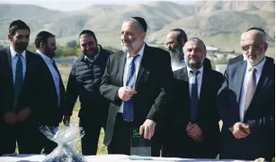  ?? (Yehonatan Valtser/TPS) ?? INTERIOR MINISTER Arye Deri tours the Jordan Valley together with members of his Shas Party yesterday.