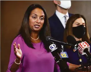  ?? Arnold Gold / Hearst Connecticu­t Media ?? Connecticu­t Department of Public Health Commission­er Manisha Juthani, left, answers questions at a news conference in New Haven on December 6, 2021.