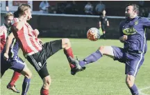  ??  ?? Sunderland RCA (red and white) battle against neighbours Ryhope CW