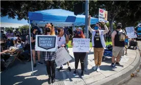  ?? Photograph: Allen J Schaben/Los Angeles Times/REX/Shuttersto­ck ?? Activision Blizzard employees stage a walkout in Irvine, California, on 28 July.