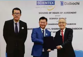  ??  ?? (From left) Scientex Bhd executive director Choo Seng Hong, managing director Lim Peng Jin and Daibochi Bhd’s former executive director Low Chan Tian at the signing ceremony in Kuala Lumpur yesterday.