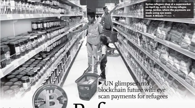  ?? Photos: IC ?? Syrian refugees shop at a supermarke­t on April 29, 2016, in Azraq refugee camp, Jordan, where the payments are made using eye scans. Inset: A Bitcoin