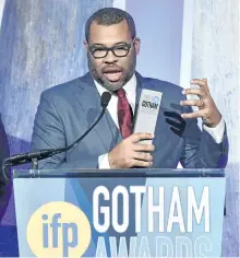  ?? EVAN AGOSTINI/INVISION/AP ?? Director Jordan Peele accepts the audience award for Get Out at the 27th annual Independen­t Film Project’s Gotham Awards on Monday, in New York.