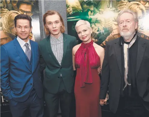  ?? Picture: GETTY IMAGES/AFP PHOTO ?? STANDING AS ONE: Mark Wahlberg, Charlie Plummer, Michelle Williams and Ridley Scott attend the premiere of All The Money in the World at Samuel Goldwyn Theater in Beverly Hills, California.