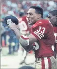  ?? ASSOCIATED PRESS ARCHIVES ?? Roger Craig shows off a Super Bowl cap late in the 49ers’ clincher over the Rams to advance to Super Bowl XXIV.