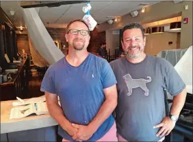  ?? DEBORAH STRASZHEIM/THE DAY ?? Dan Van Kruiningen and Ken Fontaine will open Chapter One Fine Food & Drink at 32 W. Main St. within the next two weeks. Work continued on the inside of the restaurant Monday.