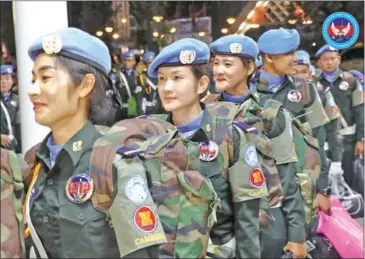  ?? NPMEC ?? A detachment of peacekeepe­rs depart for South Sudan on the night of December 13.