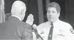  ?? TOM BENITEZ/ORLANDO SENTINEL ?? Mount Dora Police Chief John O’Grady was sworn in on Dec. 5, 2013. He was fired Tuesday.