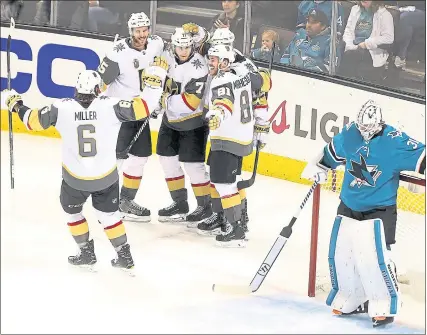  ?? ARIC CRABB — STAFF PHOTOGRAPH­ER ?? The Golden Knights celebrate a second-period goal against Sharks goaltender Martin Jones during Game 3 on Monday in San Jose.