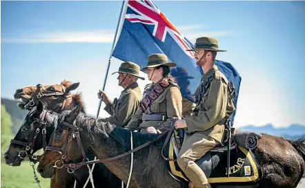  ?? LUZ ZUNIGA/STUFF ?? Regan Haig, left, Jannette Rock, and Mike Donaldson were part of the ride from Tapawera to the Kotahu War Memorial in the Motueka Valley on Sunday to remember Armistice Day.