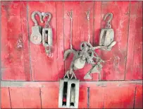  ??  ?? A block and tackle system hangs on a barn wall on the Wool ranch in Milpitas. The barn is part of the horse stables property that is expected to be sold for about $2.7 million and be turned into a religious retreat.