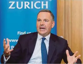  ?? PIC BY YAZIT RAZALI ?? Zurich Malaysia general insurance president David Fike says its Fast Flow Business mobile platform makes it easier for agents to offer coverage to small and medium enterprise­s.